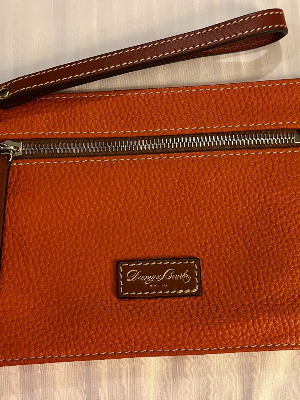 Dooney & Bourke Leather Wristlet NWOT Orange Pebble Leather British Tan Strap